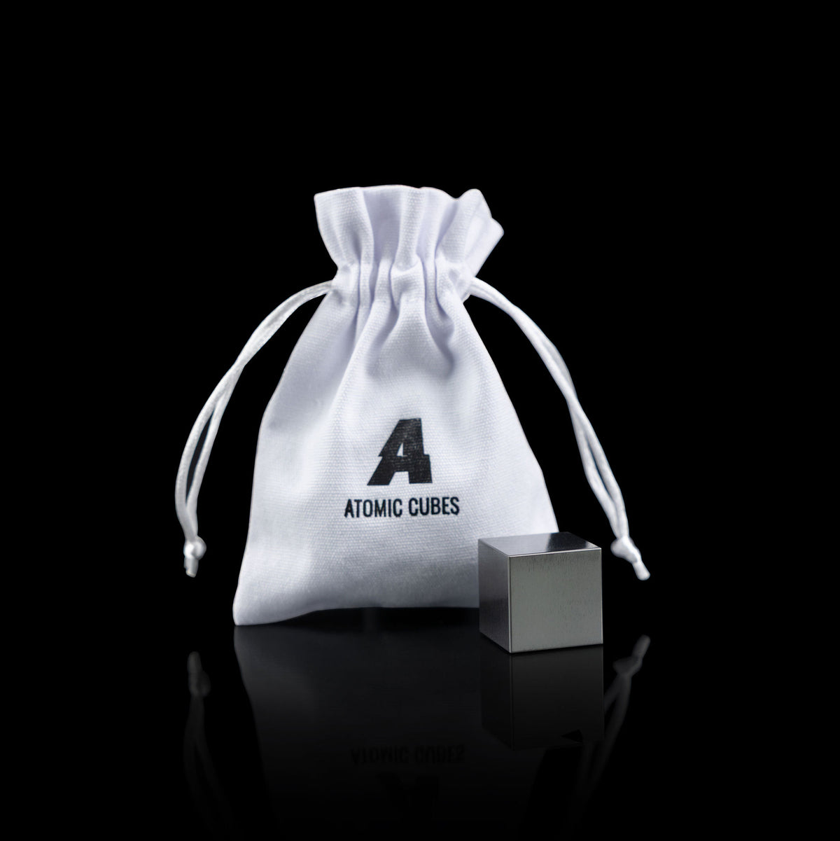 1.0-Inch Niobium Cube with its drawstring bag