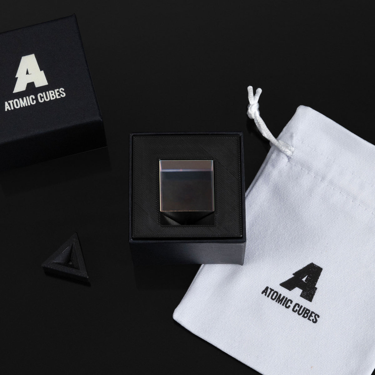 1.0-Inch Glass Cube with its box, stand and drawstring bag