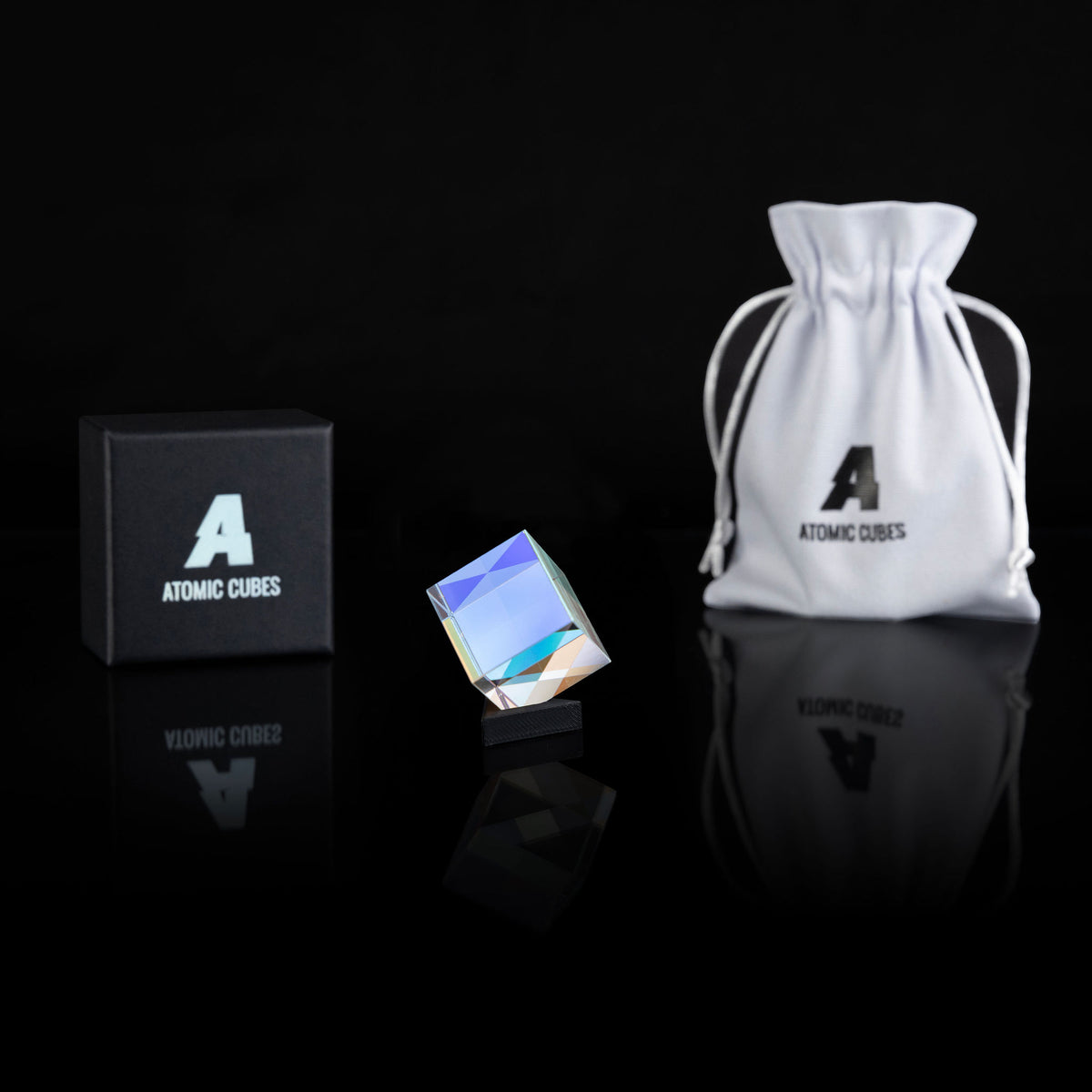 1.0-Inch Glass Cube with its box, stand and drawstring bag