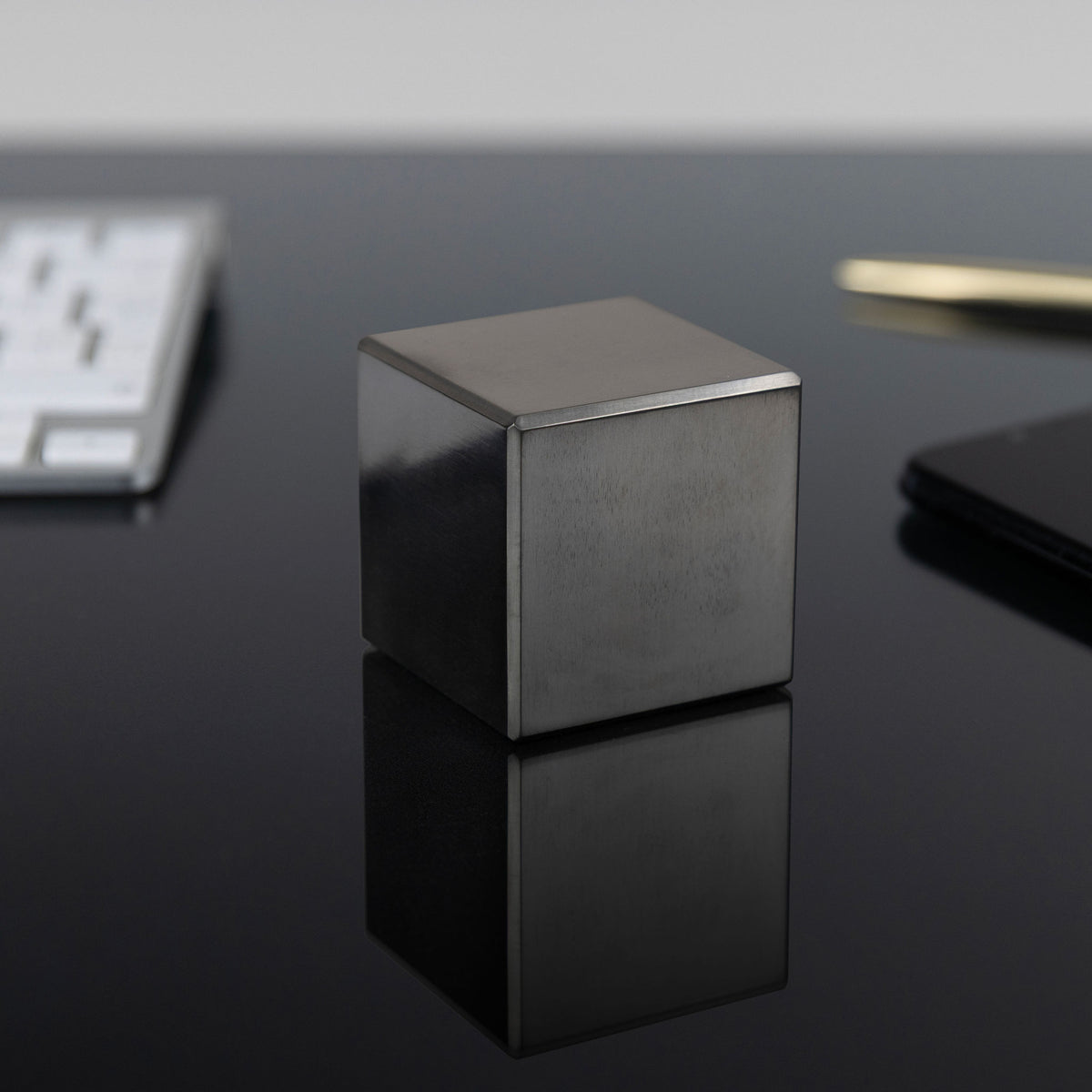 2.0-Inch Niobium Cube on a black background